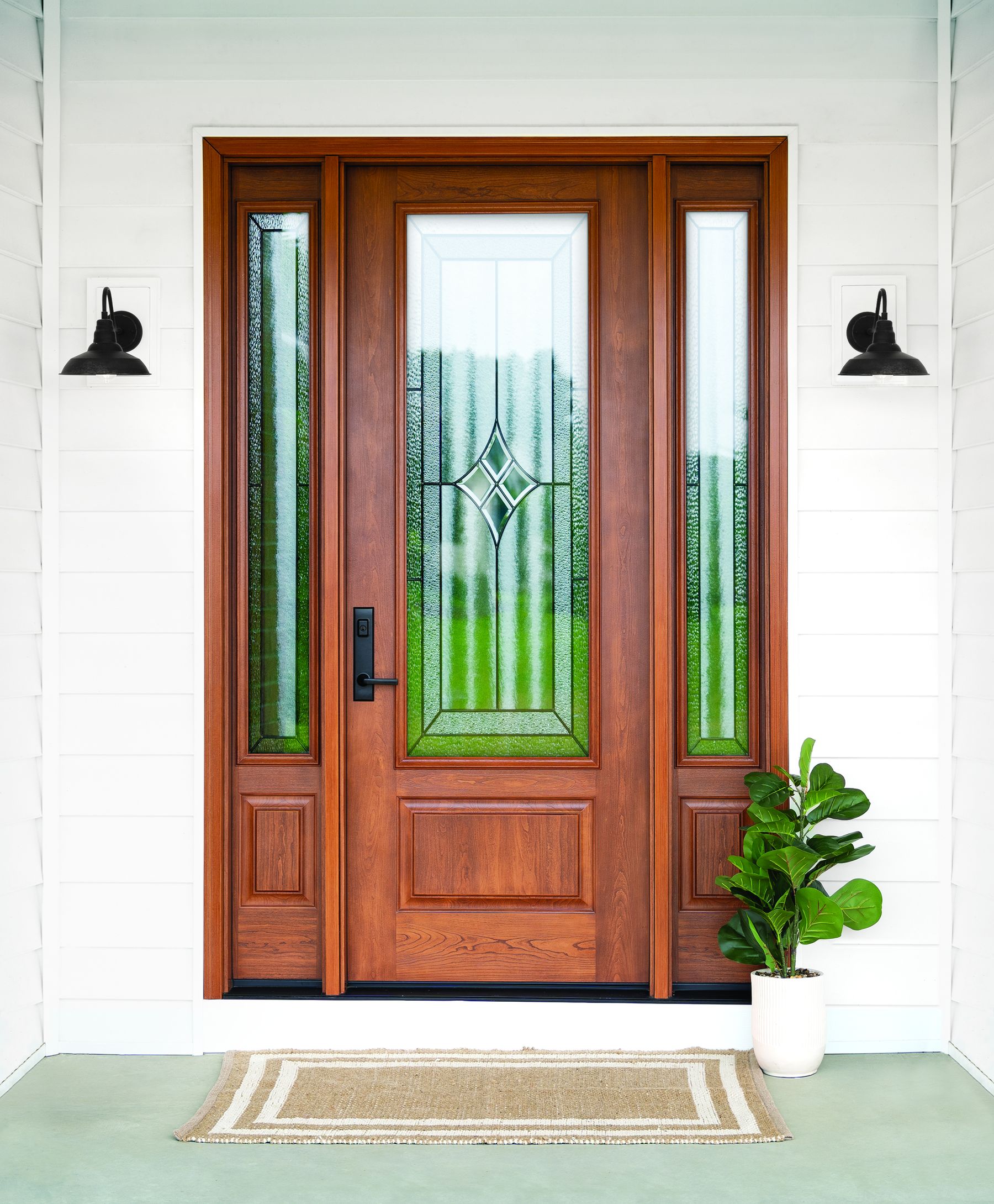 ProVia fiberglass entry door with decorative glass and sidelights